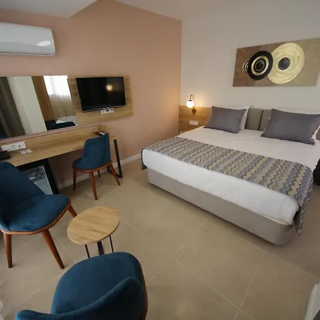 Spılos Gümüldür *